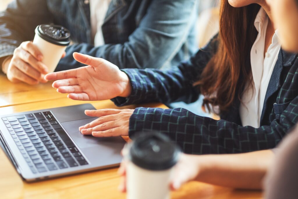 Group of businessman working and using laptop for presentation in a meeting